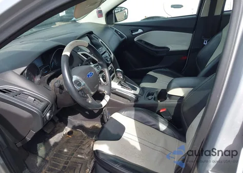 2012 Ford Focus Titanium from USA, damaged, VIN 1FAHP3J23CL214070